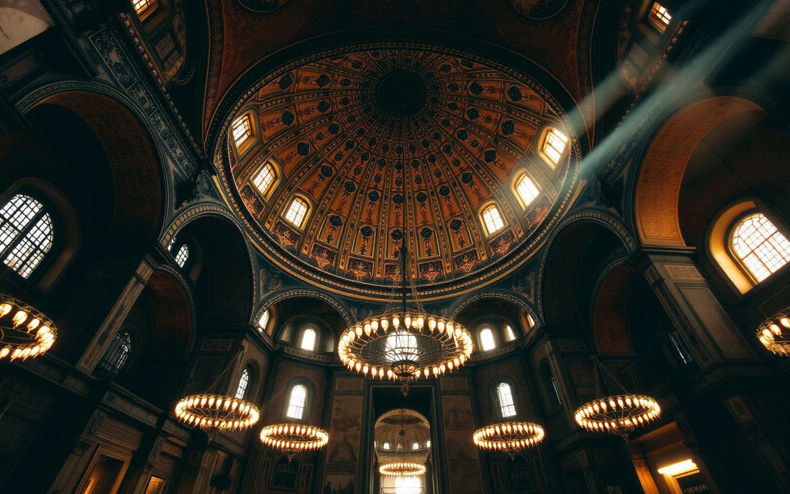 Byzantine dome and chandeliers inside Hagia Sophia